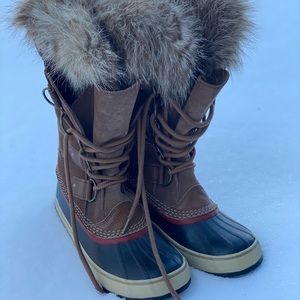 Sorel waterproof snow boots.  Faux and rubber bottoms. US size 9.
